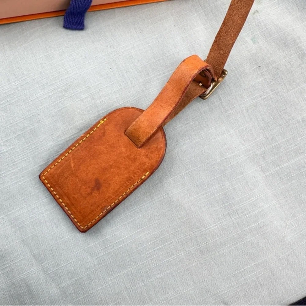 AUTHENTIC Vachetta Leather Luggage tag and loop.
